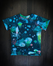 Load image into Gallery viewer, BAJA SHORTSLEEVED RASHGUARD in Bioluminescence + Baby/Toddler Swimsuit, Kids Swimsuit, Swim Shirt, Kids Surf Shirt
